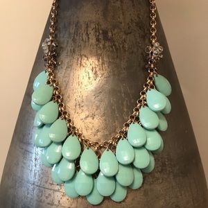 Gold tone necklace with mint green teardrop beads
